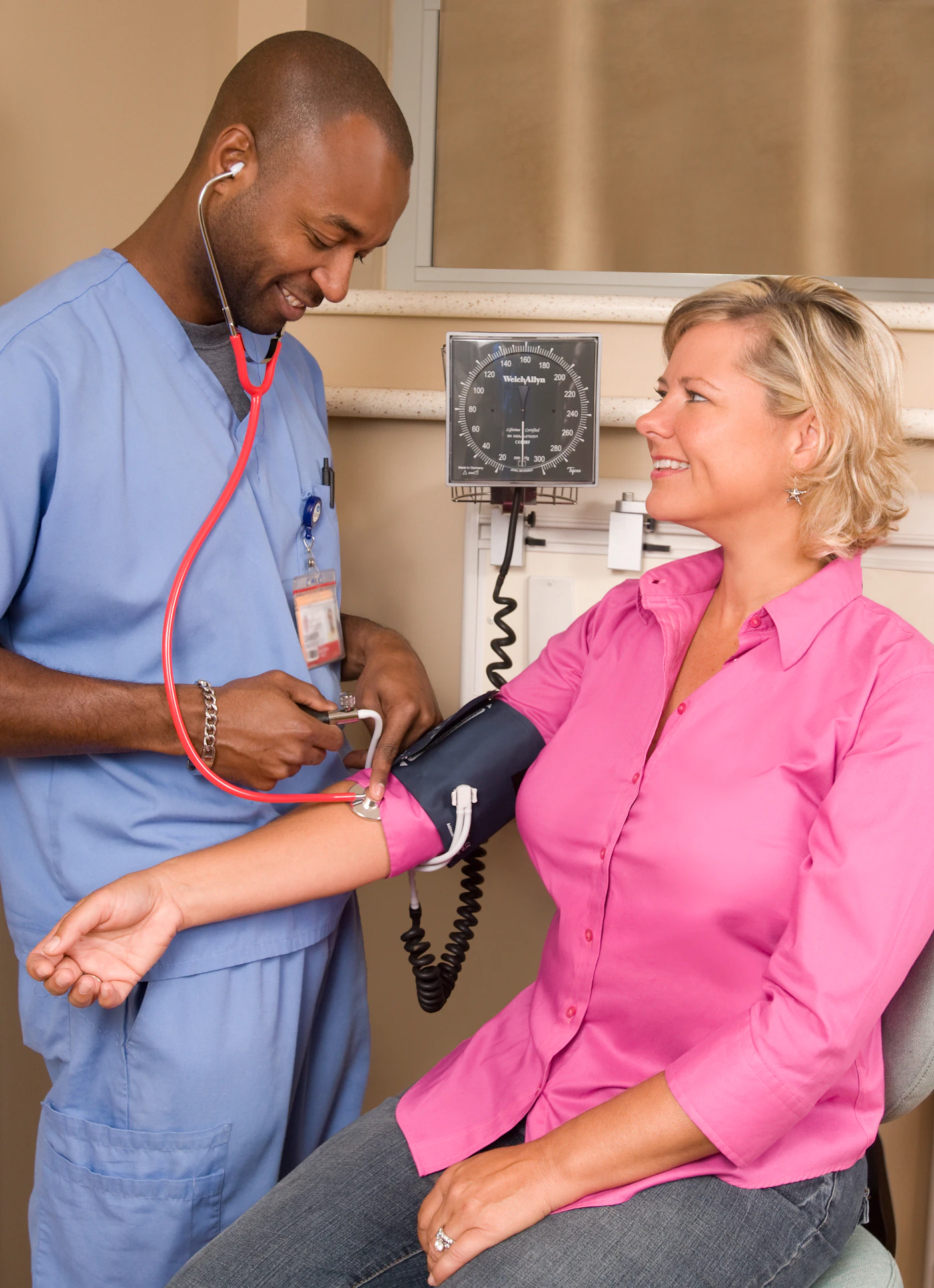 Caregiver supporting an older adult during an in-home visit